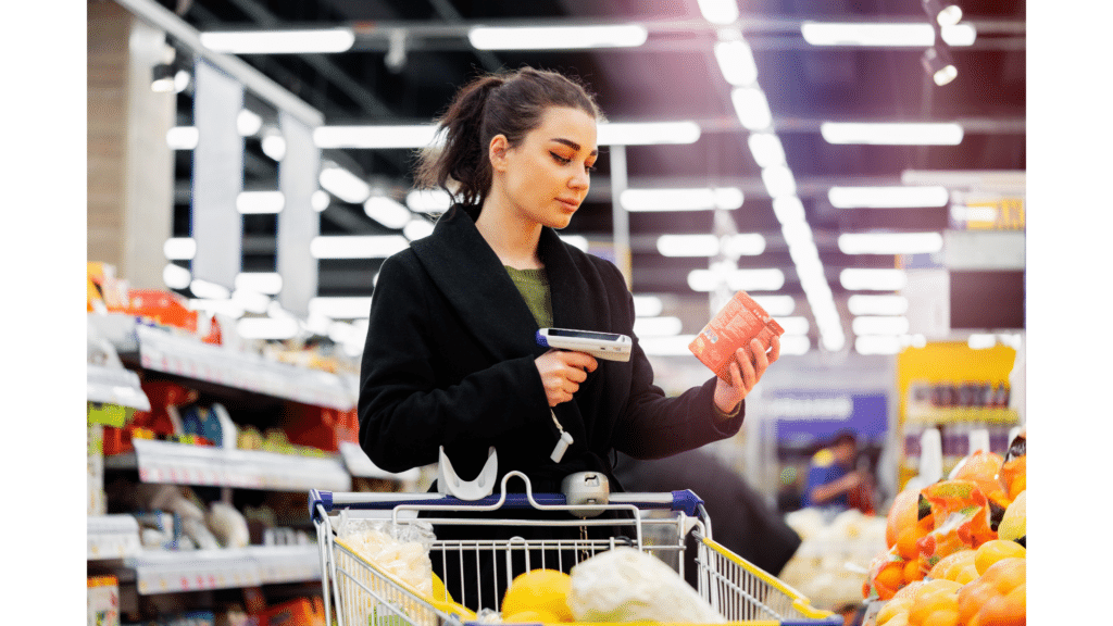 a female employee using retail anti-theft devices a supermarket